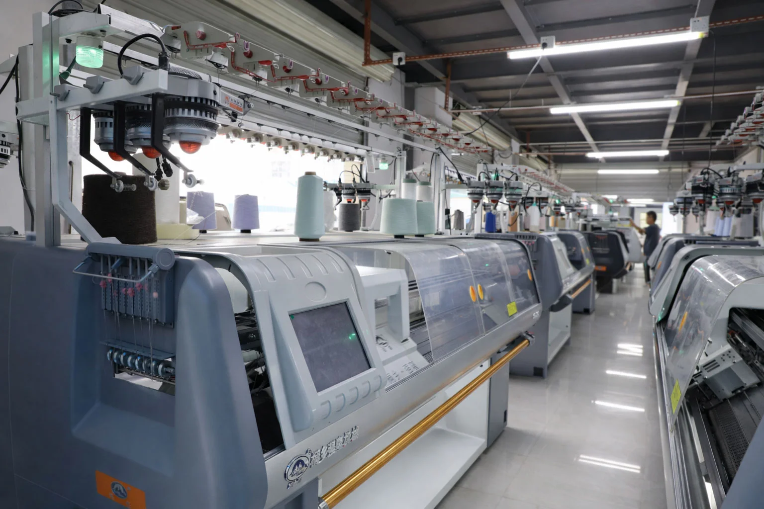 Linknit flat knitting machine production floor