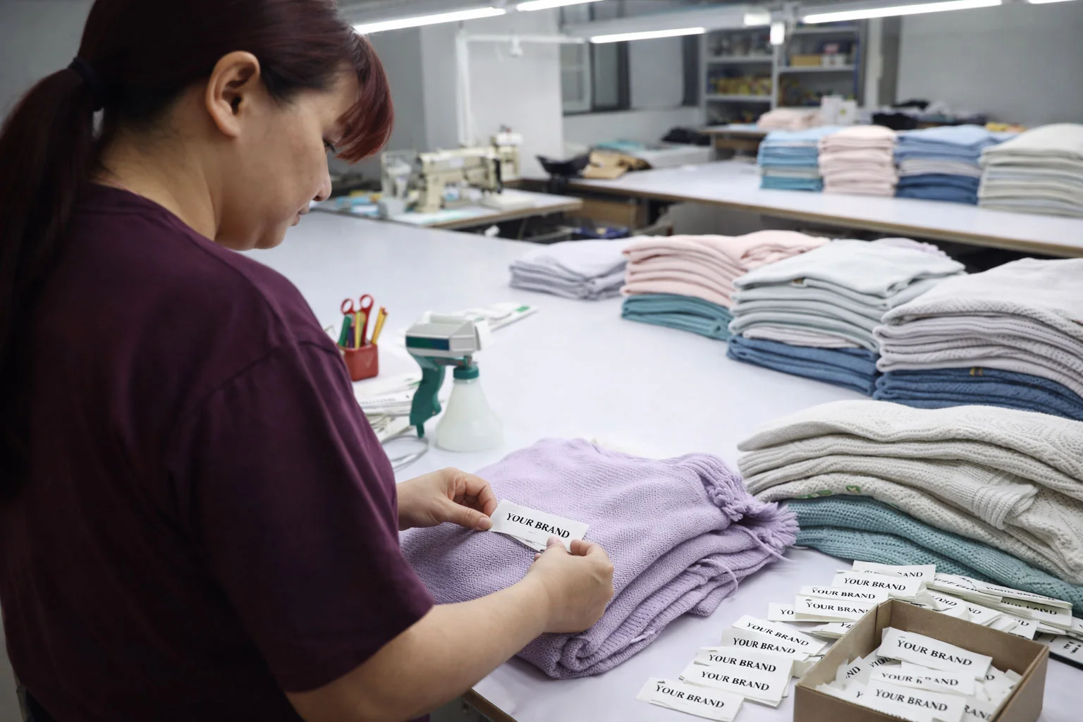 Linknit fine embroidery stitching on knitwear surface